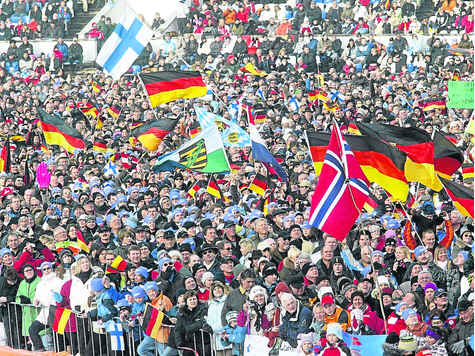 http://www.merkur-online.de/bilder/2009/01/01/29341/1830809426-fahnenmeer-olympiaskistadion-26000-fans-feuerten-skispringer.9.jpg
