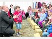 Viel Spa&szlig; f&uuml;r Gro&szlig; und Klein: Generalvikar Peter Beer besch&auml;ftigt sich zur Er&ouml;ffnung des Kindergartens mit den Kleinen. ost